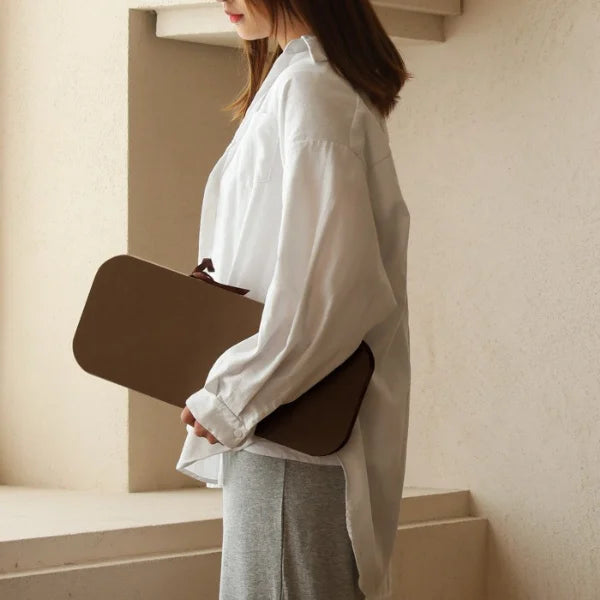 Space-saving folding stool fits under sofa